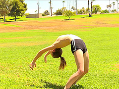 Sporty blonde babe Kenzi stuffs her pussy with a banana after workout